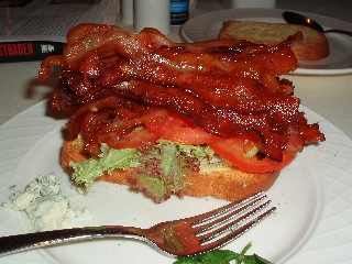 Brioche toast with blue cheese and lettuce and tomato and bacon